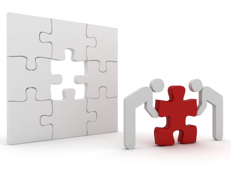 Teamwork people building solution puzzle